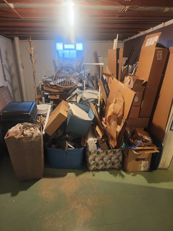 Roll-off dumpster container at job site for 4 Yard Dumpster Rental in New London